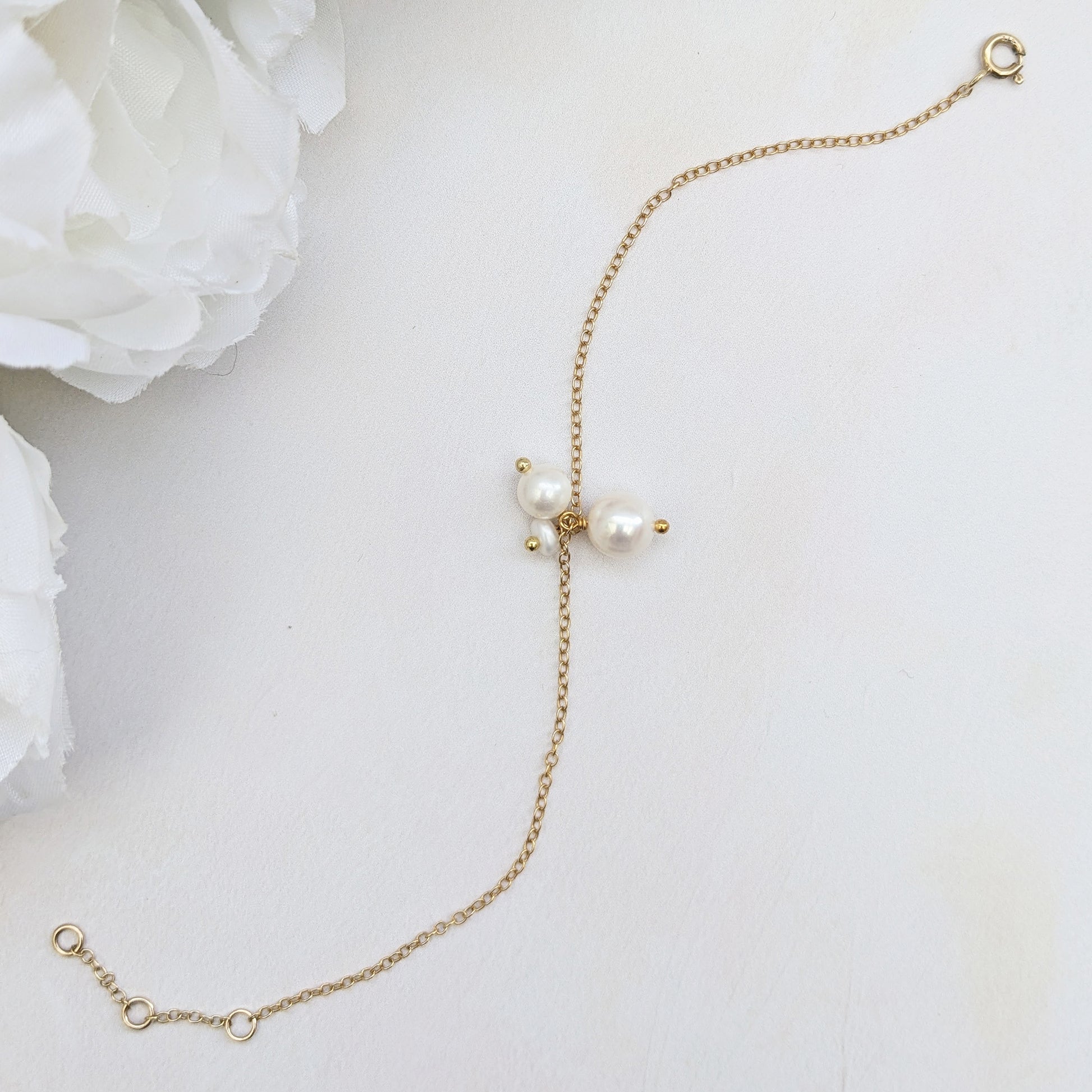Adjustable small pearl cluster bracelet for brides & bridesmaids designed & handmade by Susie Warner.