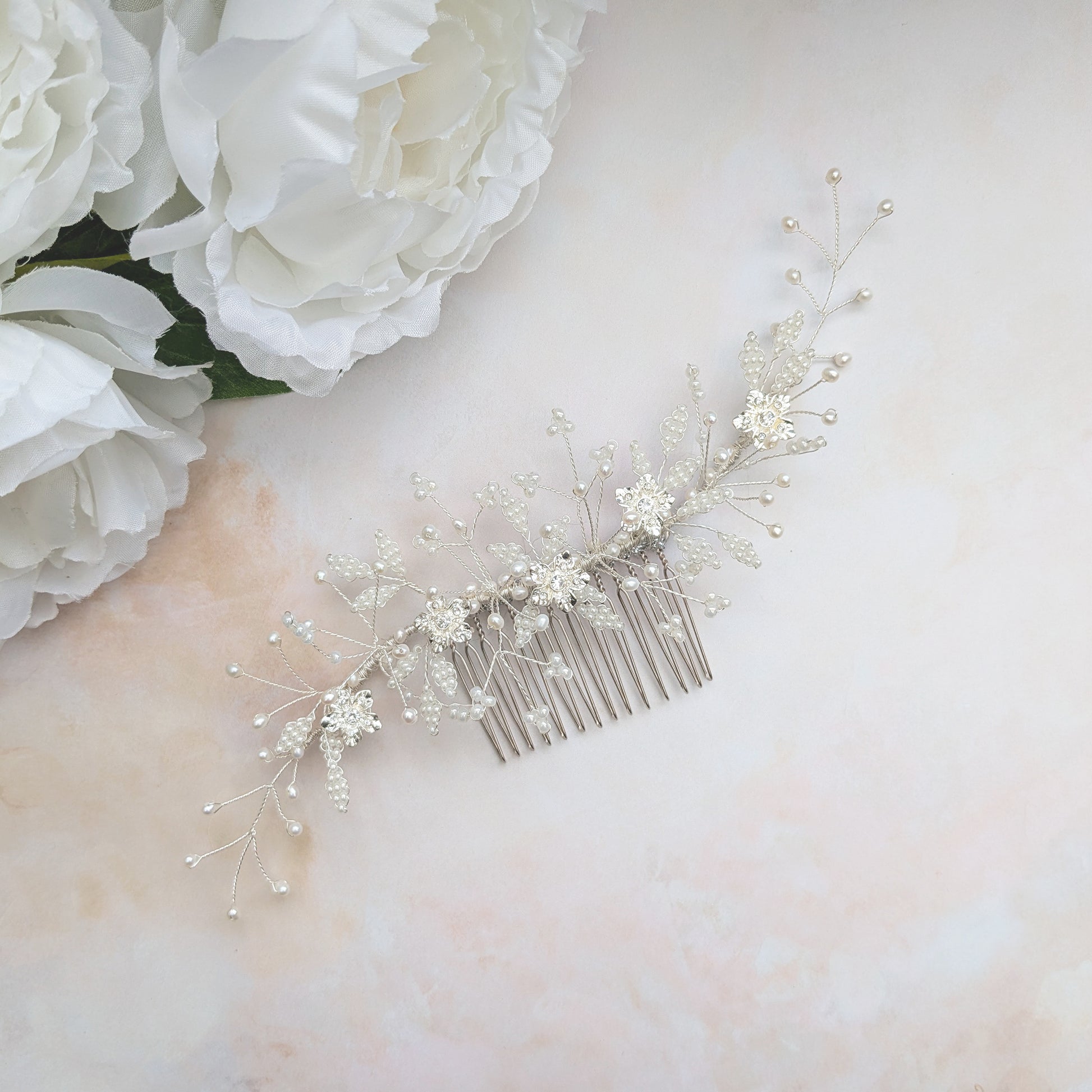 Nature inspired pearl & crystal floral wedding headpiece for brides designed & handmade by Susie Warner.