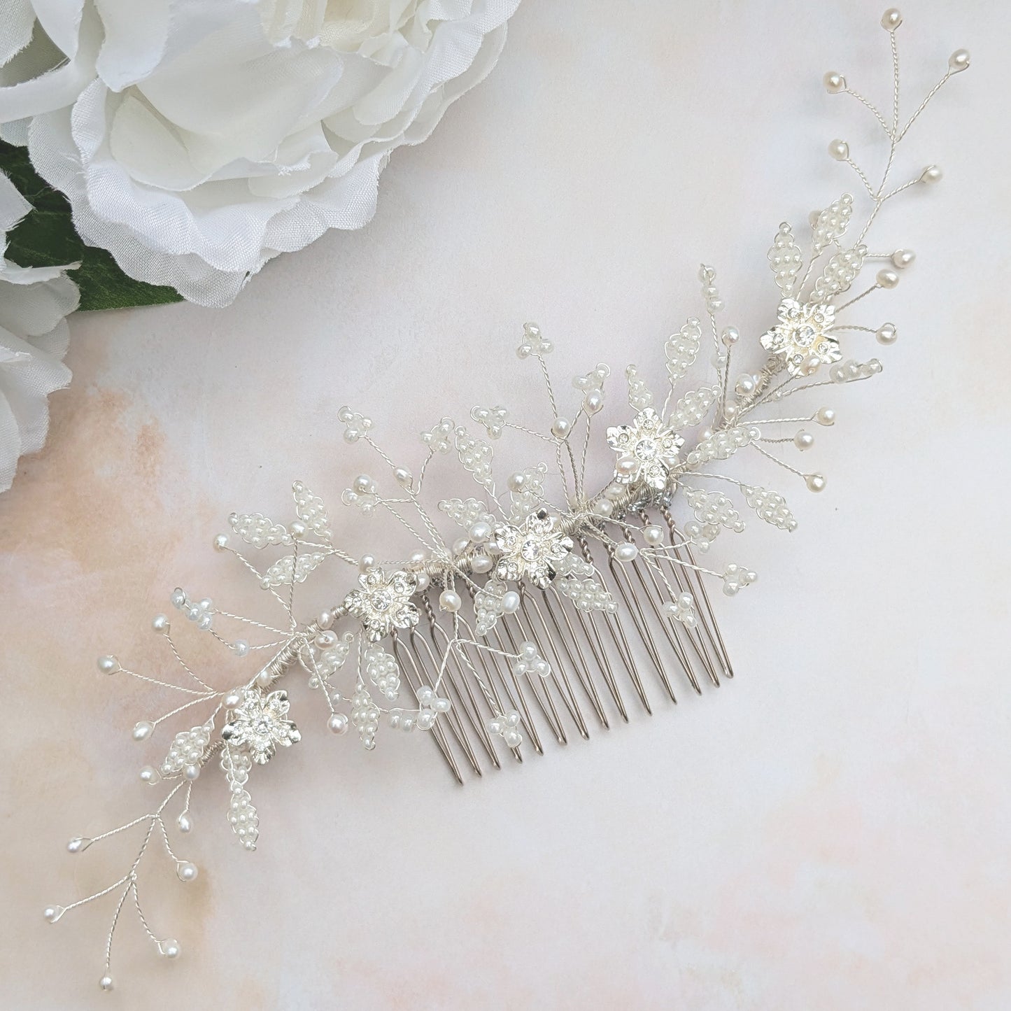 Modern nature inspired floral bridal headpiece for weddings designed & handmade by Susie Warner.