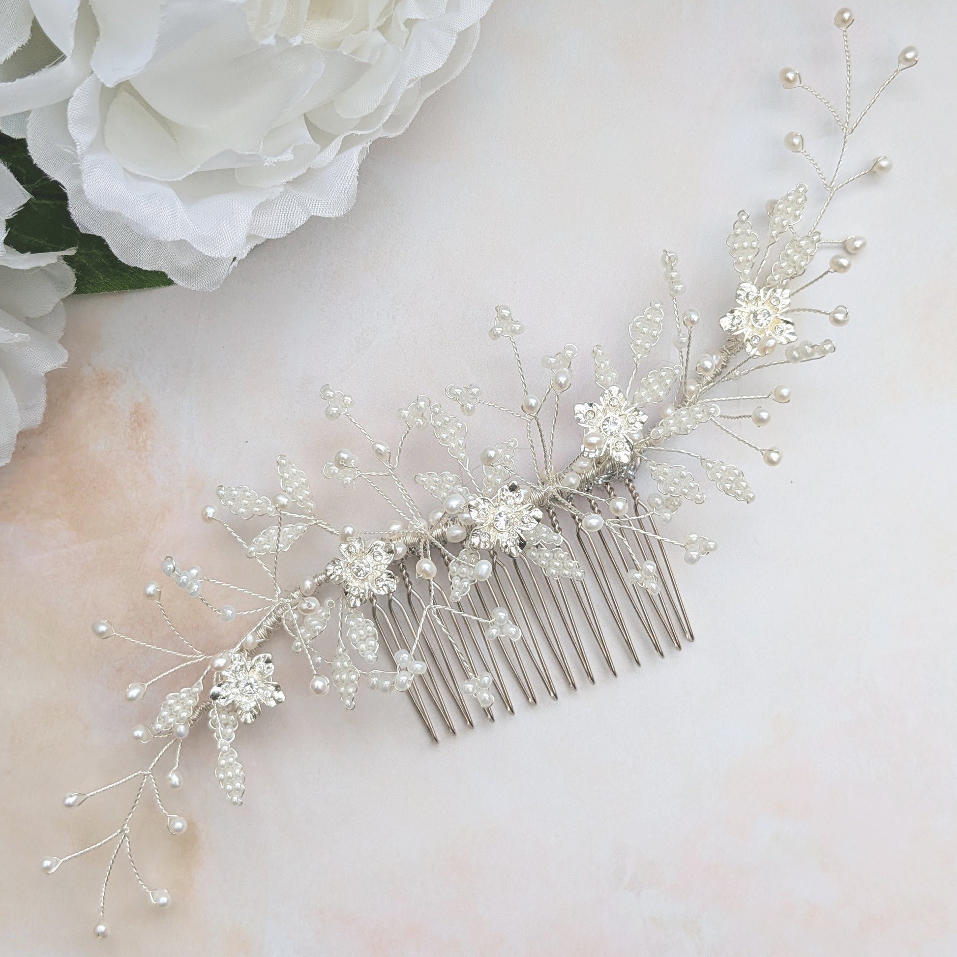 Modern nature inspired floral bridal headpiece for weddings designed & handmade by Susie Warner.
