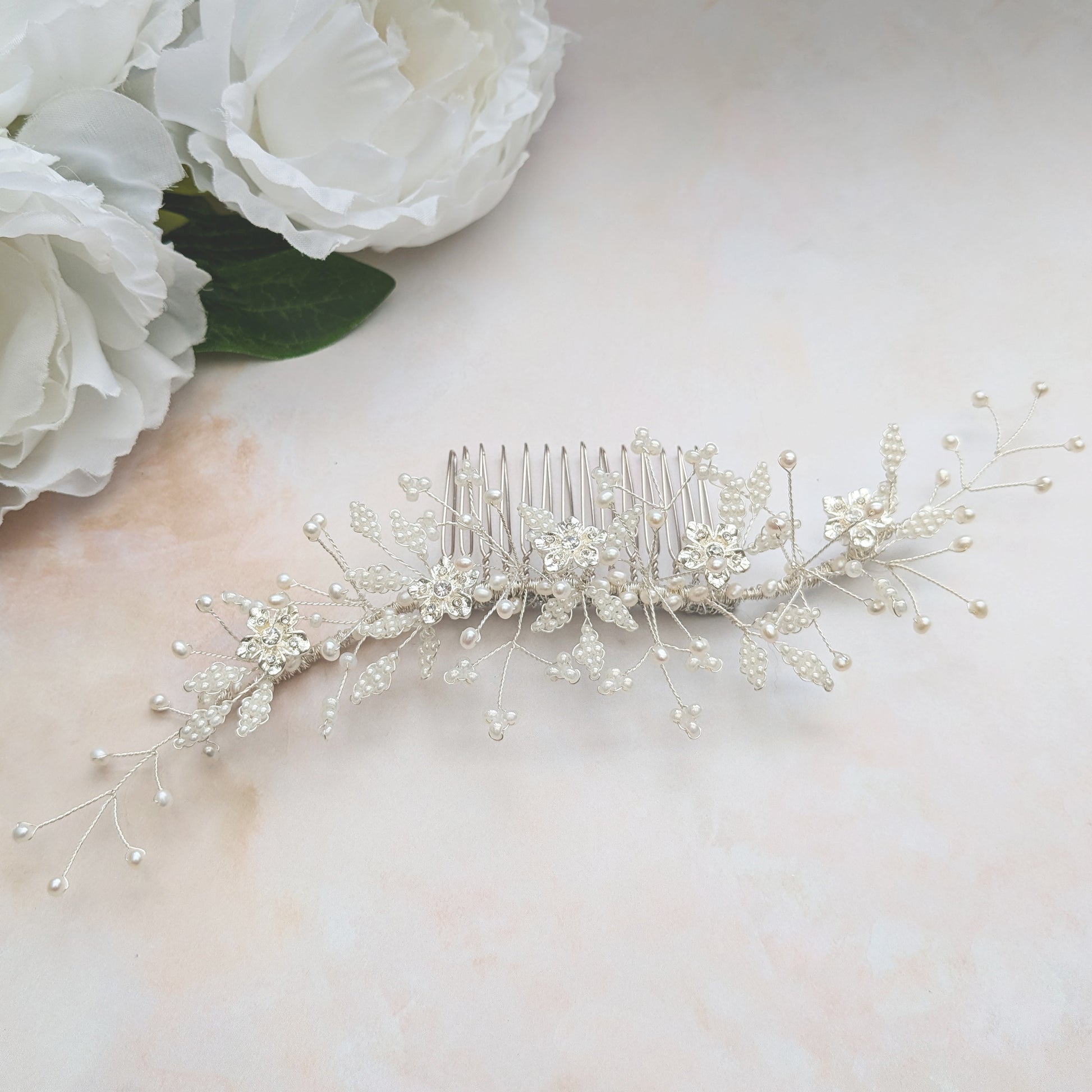 Detail of pearl & crystal floral wedding headpiece for brides designed & handmade by Susie Warner.