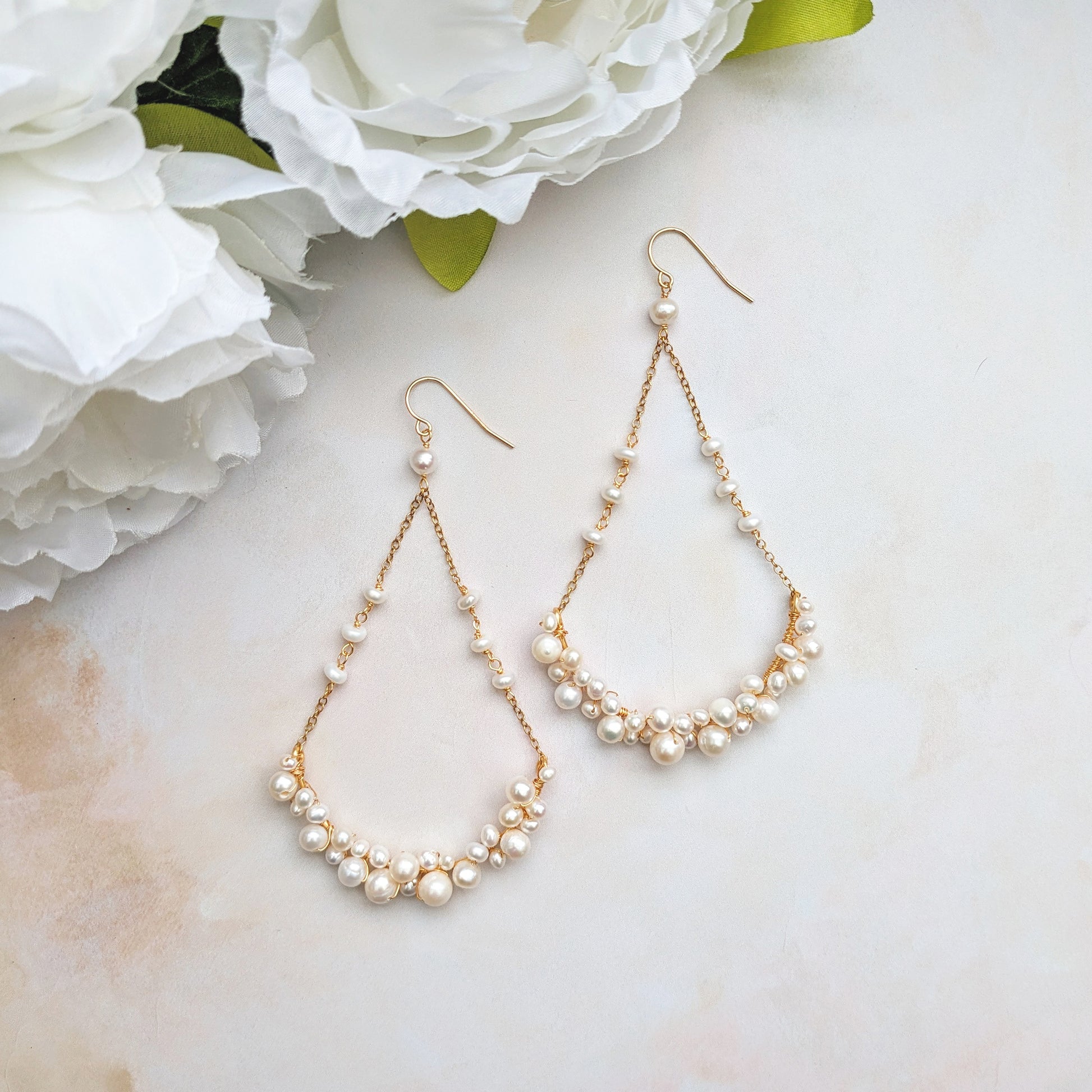 Statement modern freshwater pearl chandelier earrings designed & handmade by Susie Warner.