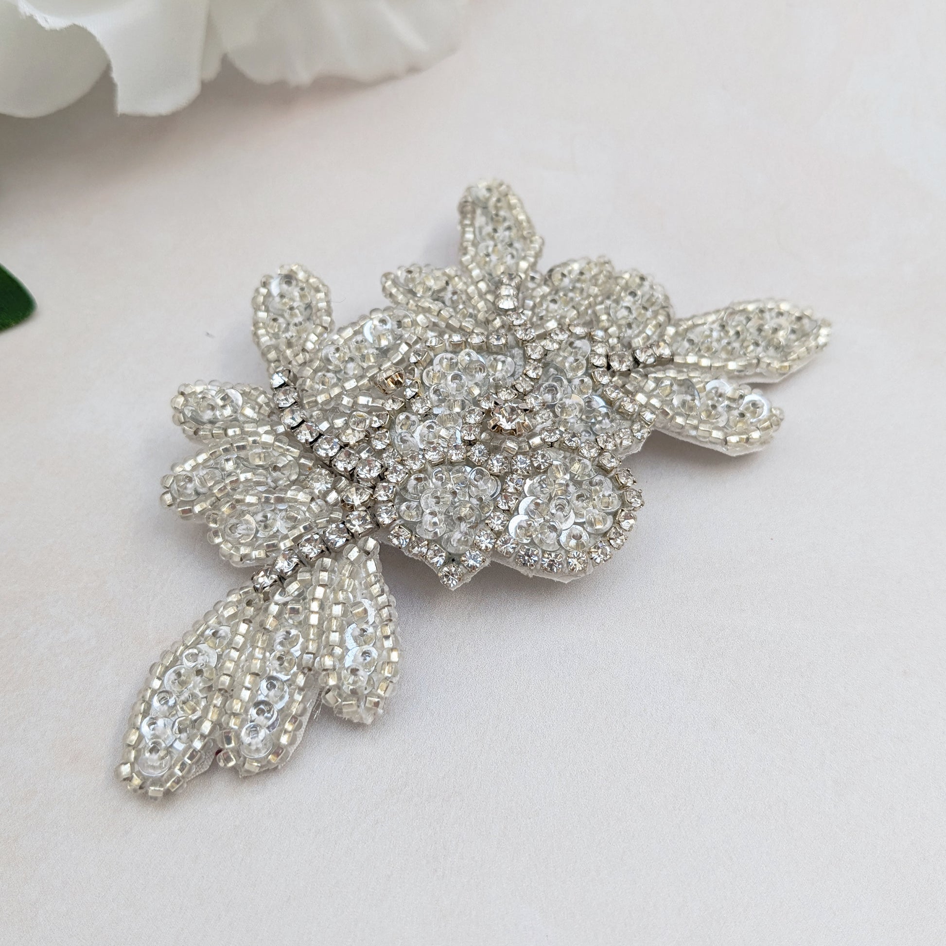 Nature inspired silver beaded floral hair clip for brides designed & handmade by Susie Warner