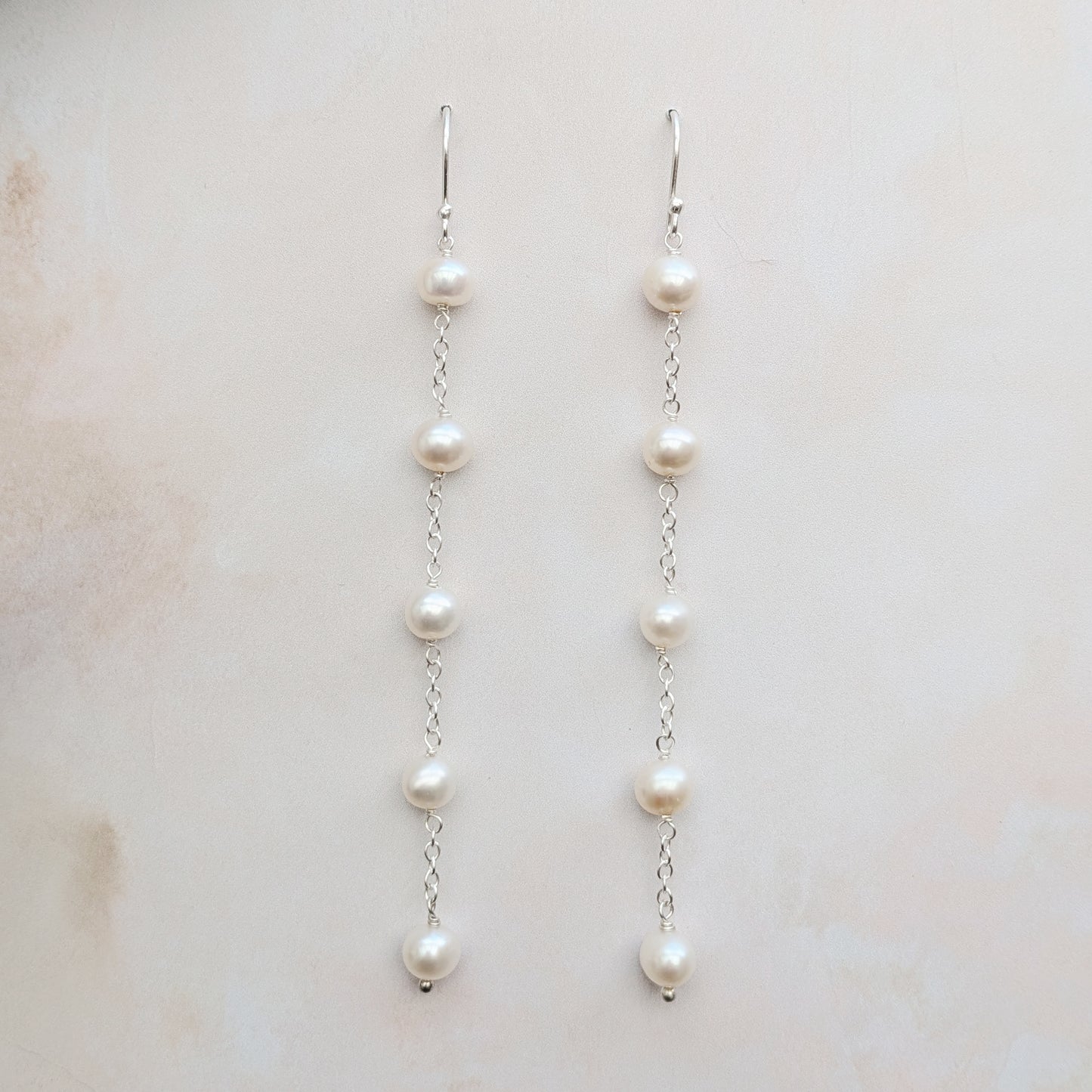 Statement pearl chain drop earrings for brides designed & handmade by Susie Warner.
