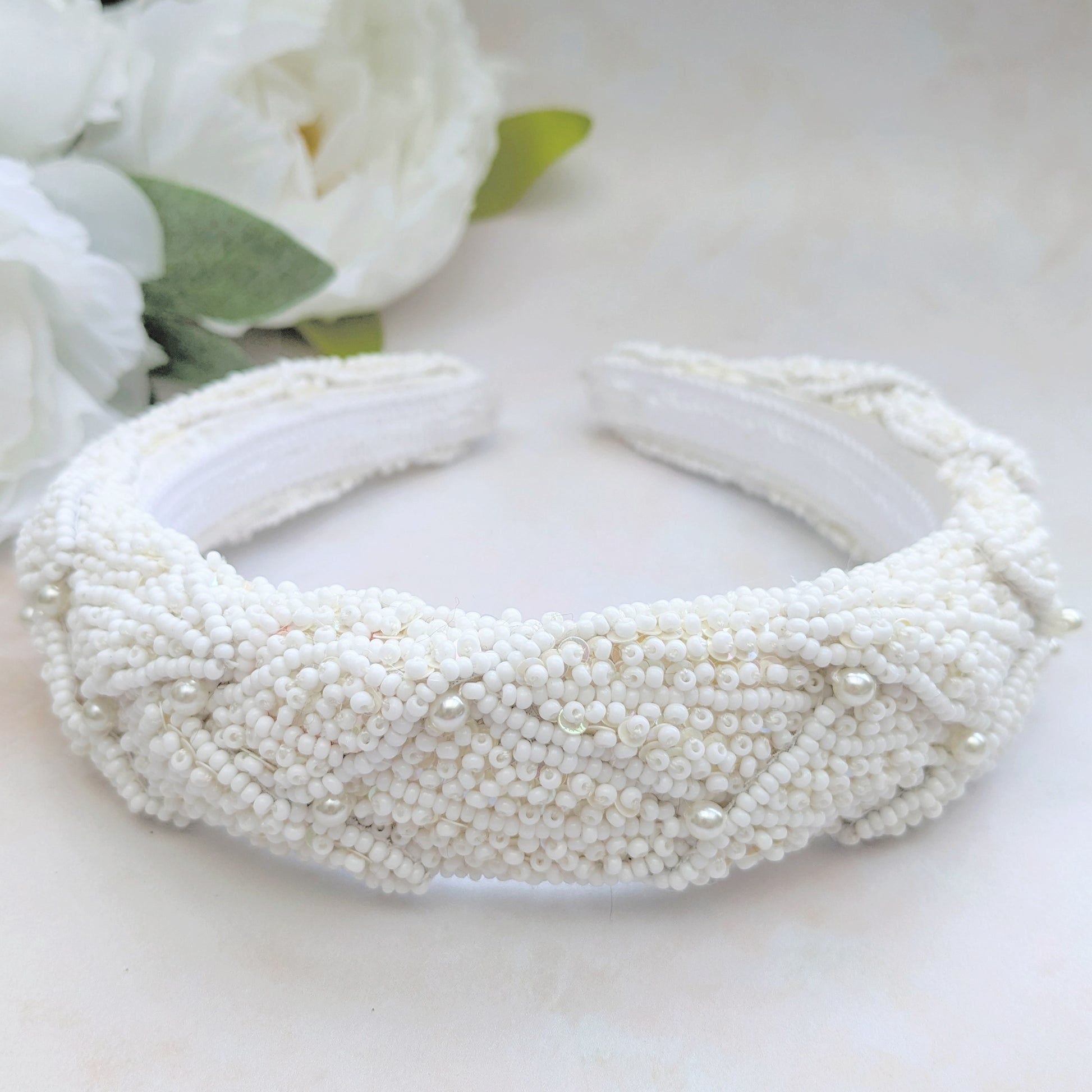 Statement hand embroidered pearl leaf headband for weddings designed & handmade by Susie Warner.