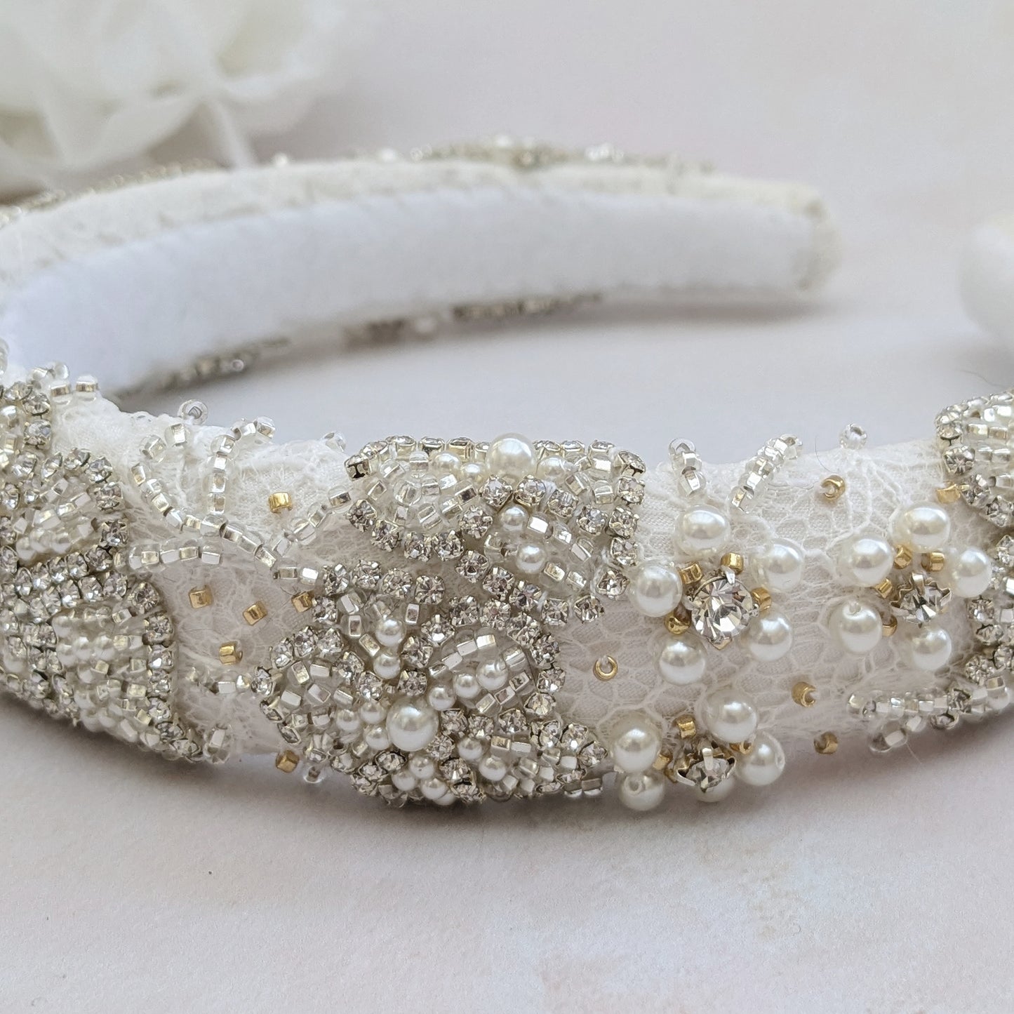 Statement pearl beaded floral padded headband for brides designed & handmade by Susie Warner.