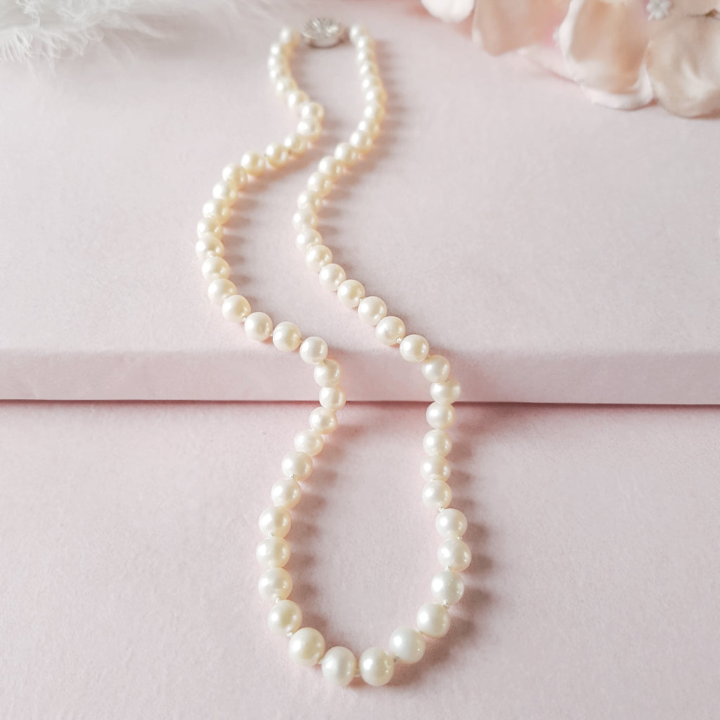 classic Pearl necklace with decorative Silver & CZ clasp designed & handmade by Susie Warner.