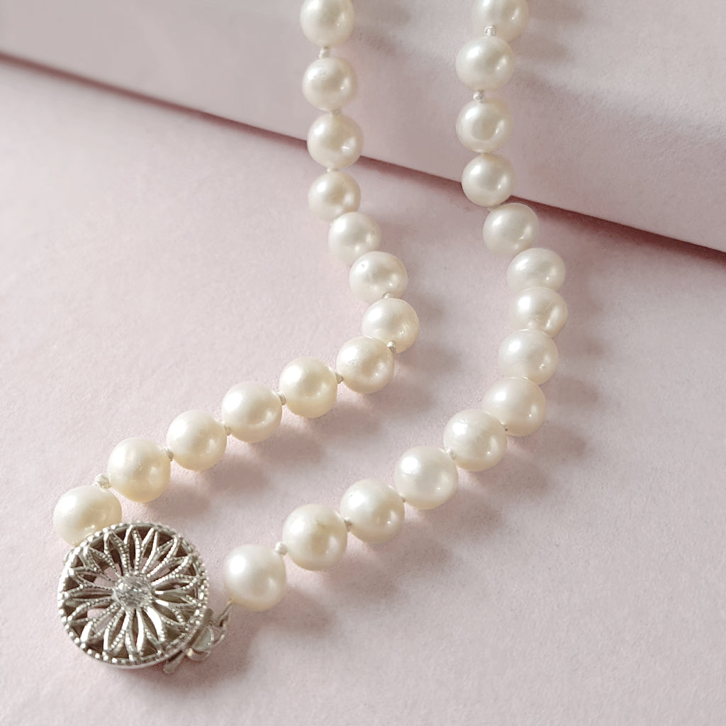 Pearl necklace with vintage Silver & CZ clasp designed & handmade by  Susie Warner.
