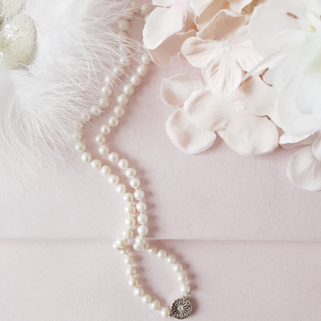 Pearl necklace with art deco Silver & CZ clasp designed & handmade by  Susie Warner.
