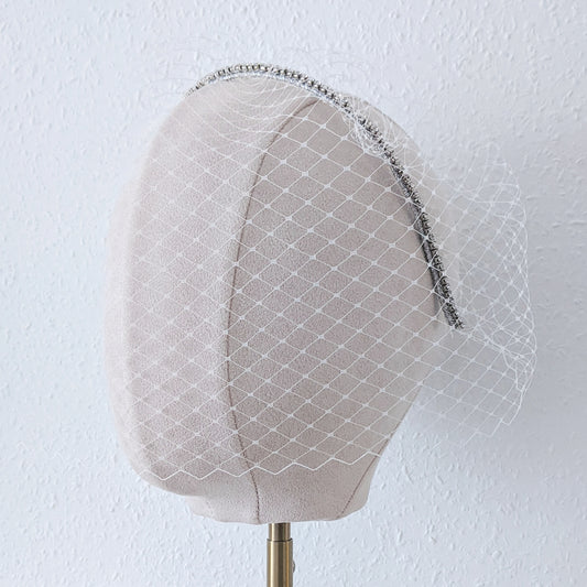 Modern crystal birdcage veil designed & handmade by Susie Warner.